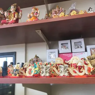 a shelf full of figurines