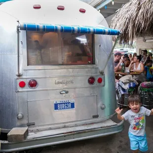 Pickup your food at the back of the airstream when the buzzer sounds.