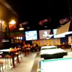 spacious spot! well maintained tables, delicious menu, big variety of booze, fun jukebox, ALOT of BIG TVs... perfection.
