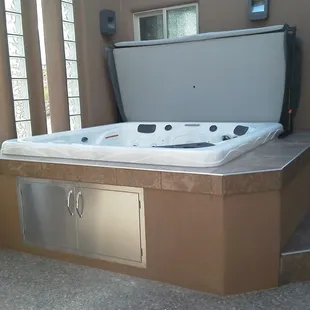 Indoor/outdoor spa installation for a client.