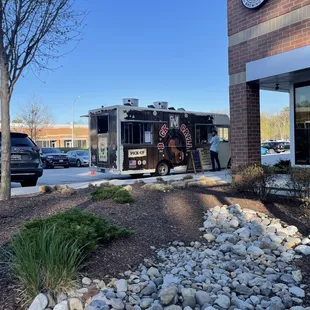a truck parked outside of a building