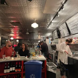 a group of people in a restaurant