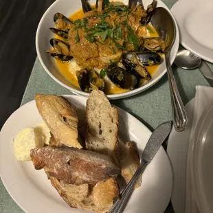 Baguette; mussels and shrimp over grits