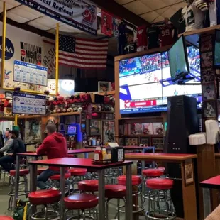 a man sitting at a table in a restaurant