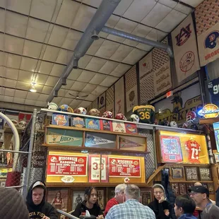 Place is littered with sports memorabilia like old helmets, banners and signs. It's a pretty cool place.