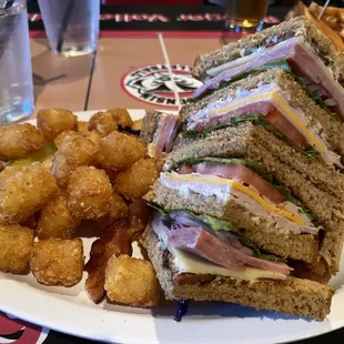 Club sandwich is meh...tots are burned