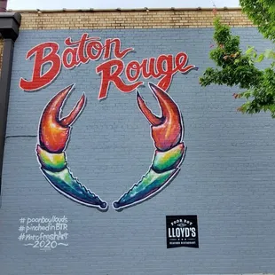 a painted lobster on the side of a building