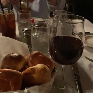 a plate of bread and a glass of wine