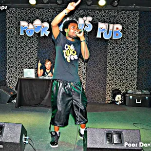 a man performing on stage