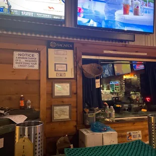 a bar with a flat screen tv