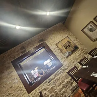 Picture window to opposite dining area. Super cute.