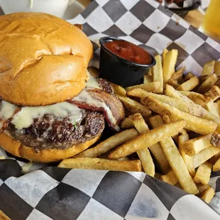 Bacon &amp; Brie Burger House-made bacon &amp; creamy brie With a side of Morito BBQ- not pictured apple fennel slaw.