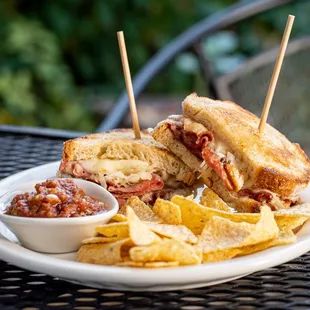 a plate of food and a beer