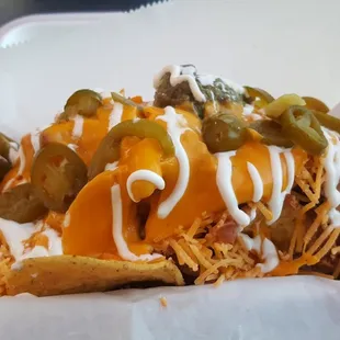 Nacho supreme has meat bean cheese you gotta try