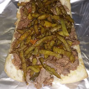 ows a meat and vegetable sandwich