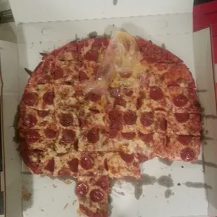 One big pizza and about to take the first bite ! Mmm mmmmmn good!