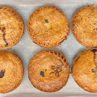 Top row: Classic Chicken Pot Pies Bottom row: Steak &amp; Ale (fave), Green Hog &amp; Cheese (least fave), Veggie Pot Pie