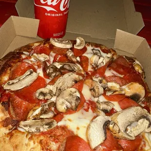 Personal pizza, pepperoni, and mushrooms.