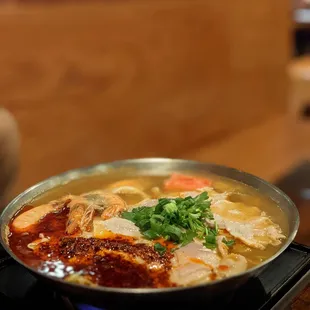 a bowl of soup on a stovetop