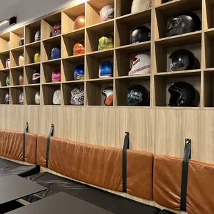 a row of helmets on display