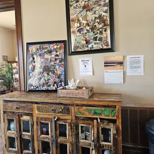 a coffee shop with a large wooden cabinet