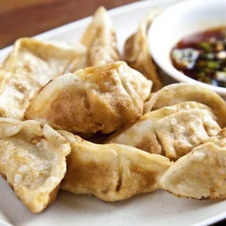 E7. Pot Sticket (8 pieces)