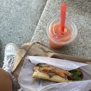 BBQ pork bahn mi and a mango strawberry smoothie