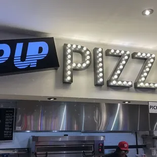 the sign above the counter