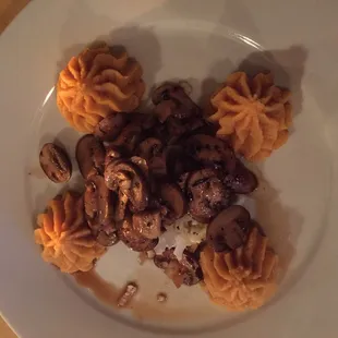 Vegetarian gluten free entree made by the chef upon request - cauliflower rice with sautéed mushrooms and polenta.