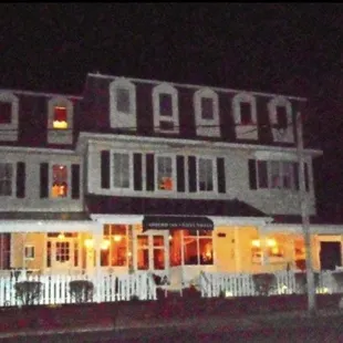 the front of pope's tavern at night