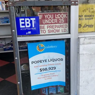 a sign in the window of a store