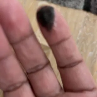 My finger after I tried to check what was on the Mac n cheese.