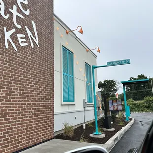 a brick building with graffiti on it