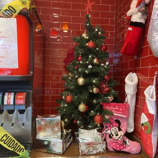 a christmas tree in a kitchen