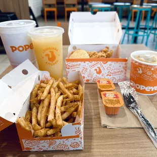 5 piece spicy chicken strips, biscuit, medium fries and drink, frozen mango lemonade.