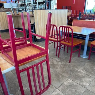 red chairs and tables in a restaurant