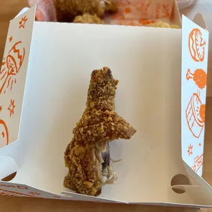 a fried chicken in a box