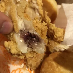 a closeup of a fried chicken sandwich
