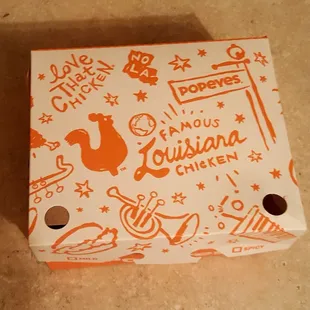 a close up of a pizza box