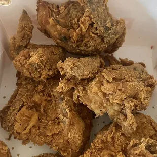 Two wings and other pieces of white meat that were over cooked.