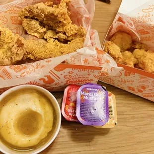 Half Spicy &amp; non spicy tenders, mashed potatoes, biscuits and fries hiding lol and fried shrimp