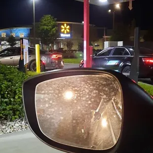 a view of a gas station at night