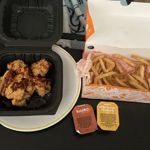 Honey bbq New 6 Classic Boneless Wings and Cajun Fries and Bold BQ Sauce and wild honey mustard sauce