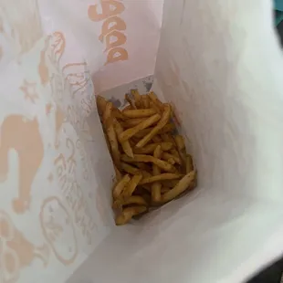 Regular Cajun Fries thrown in bottom of bag