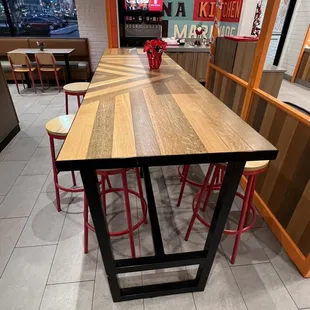 a table and chairs in a restaurant