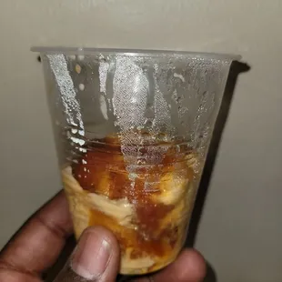 This is macaroni and cheese that was served in a drinking cup.  Not really appealing.