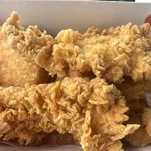 1/4 Popcorn Shrimp + 2 Spicy Chicken Tenders combo. Came with a drink and a biscuit as dry as the Sahara. They forgot the Mashed Potatoes.