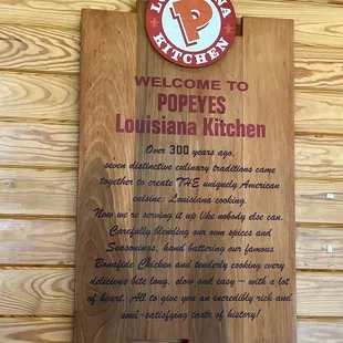 a sign for popeyes louisiana kitchen