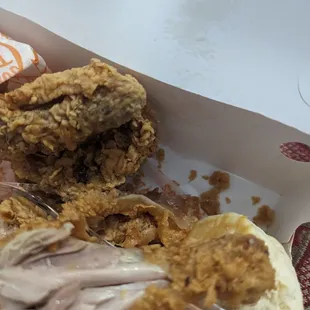 a fried chicken sandwich in a box