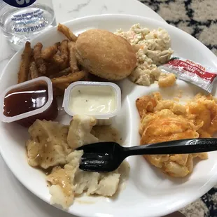 Mac n cheese, coleslaw, biscuit, mashed potatoes and gray, Cajun fries with the dipping sauces (buttermilk ranch and sweet heat)